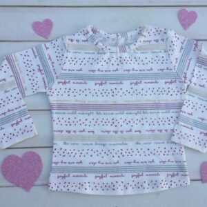REMERA M/L FONDO BLANCO CON PUNTOS BORDOS Y BRILLOS BBY